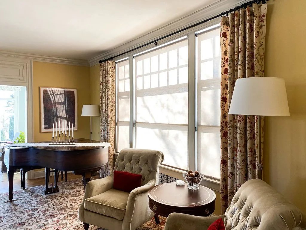 Hunter Douglas Designer Roller Shades with Drapery Panels in Sitting Room