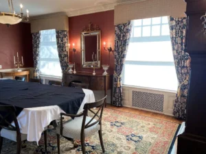 Hunter Douglas Designer Roller Shades with Drapery Panels in Dining Room