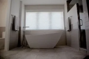 Bathroom installed with Hunter Douglas Duette Architella Shades