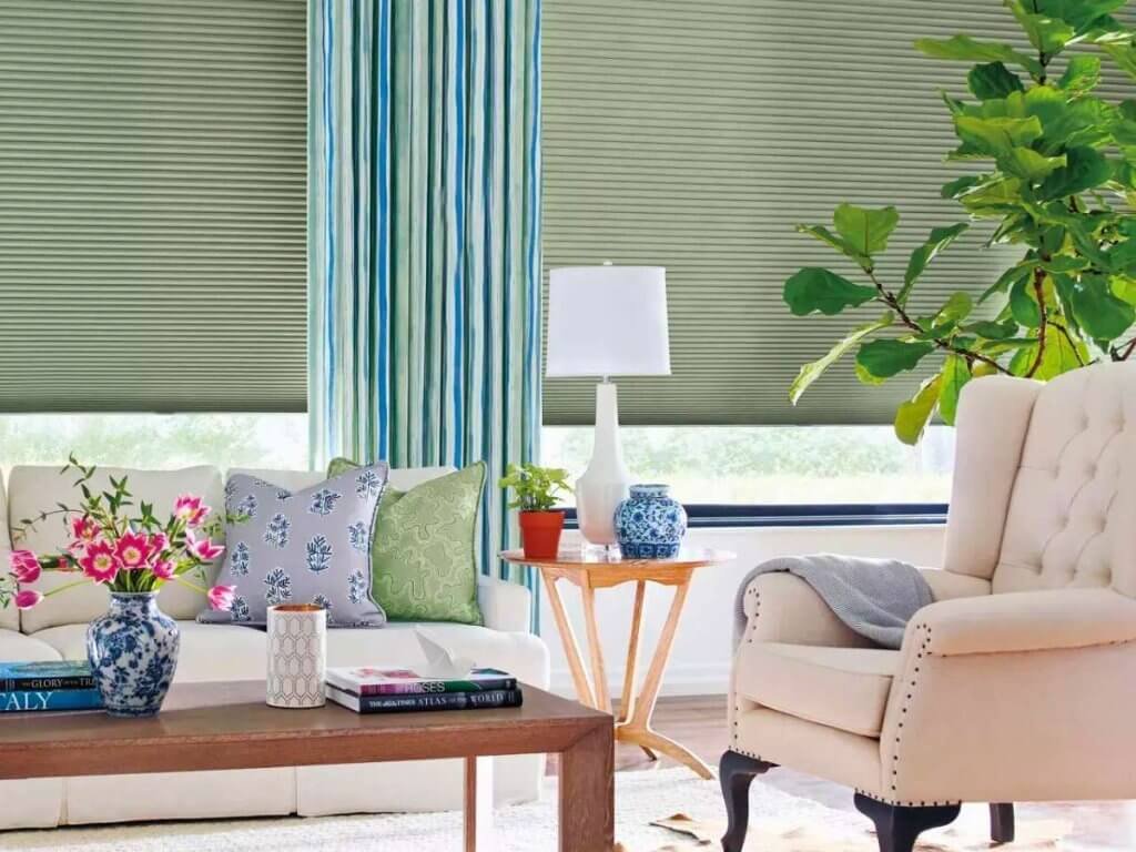 Match quality. Silk, velvet, linen, wool, and hardwoods add elegance and durability. Blended fabrics (polyester, cotton mixes) balance easy care with high-end looks.