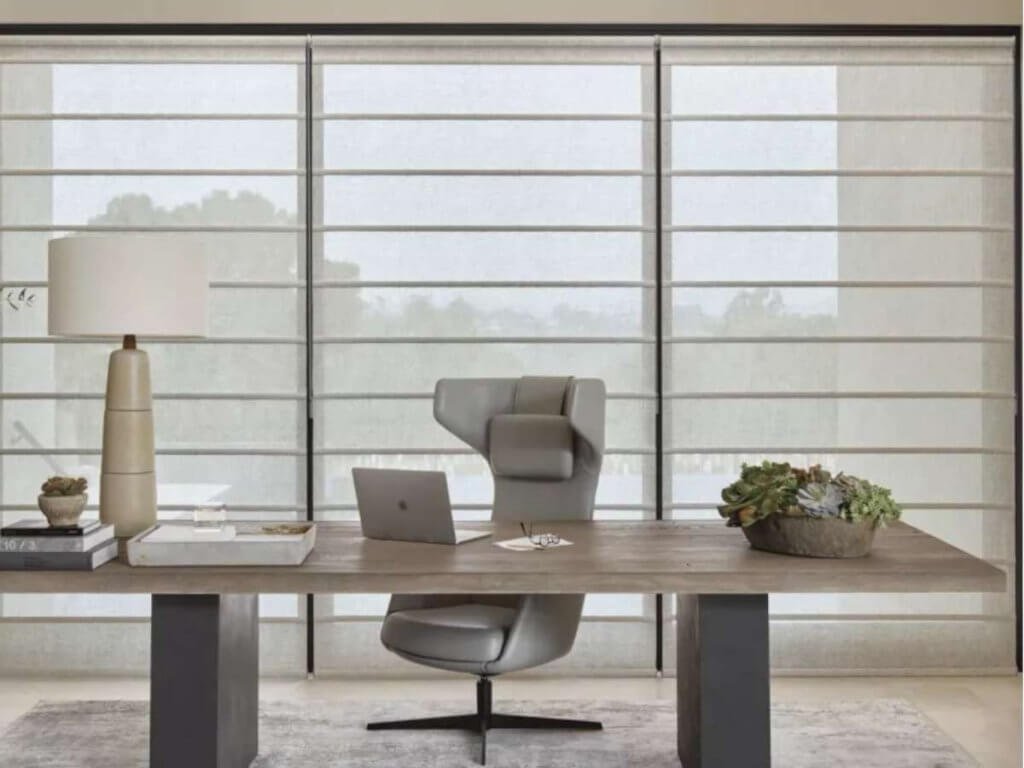 Hunter Douglas Alustra Roller Shades in a Home Office Large Window