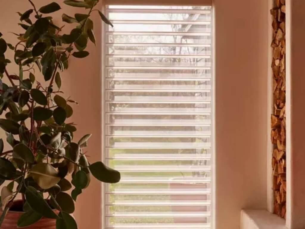 Silhouette shades feature adjustable vanes suspended between two sheer fabrics. This design allows you to fine-tune how much light enters your space while reducing glare.